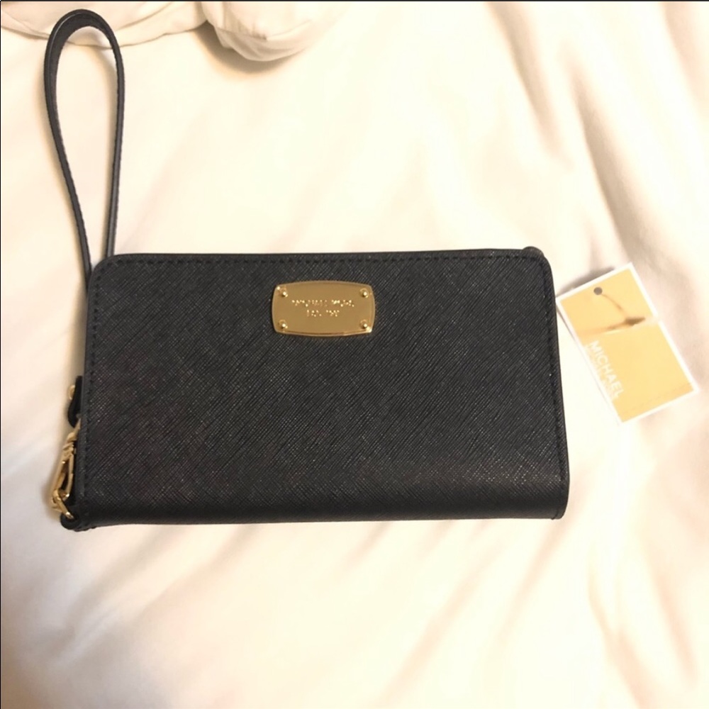 Michael Kors wristlet tech wallet